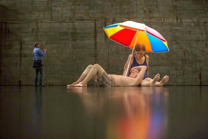 Couple under an Umbrella by Australian artist Ron Mueck